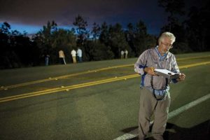 Win Everham records data during a Frog Watch outing.