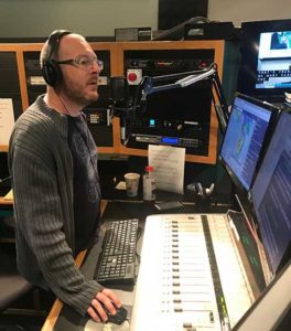 Photo shows John Davis of WGCU-FM