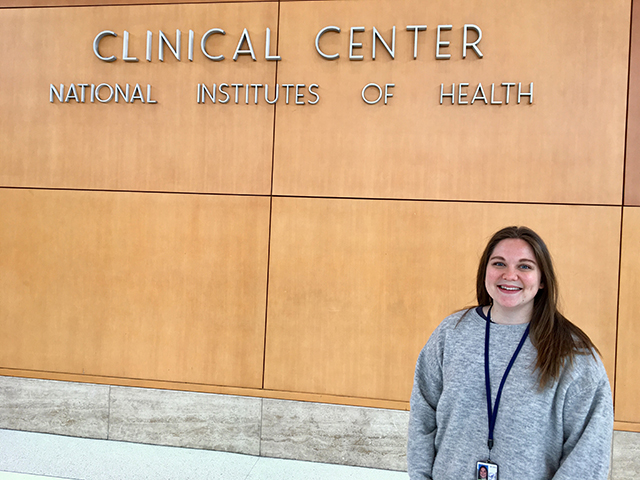 Photo shows FGCU alumna at NIH