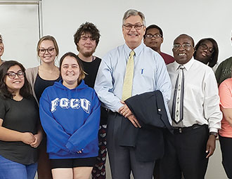 Photo of Fort Myers Mayor Randy Henderson with the Intro to Diversity class at FGCU.