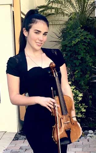 Photo shows student with violin