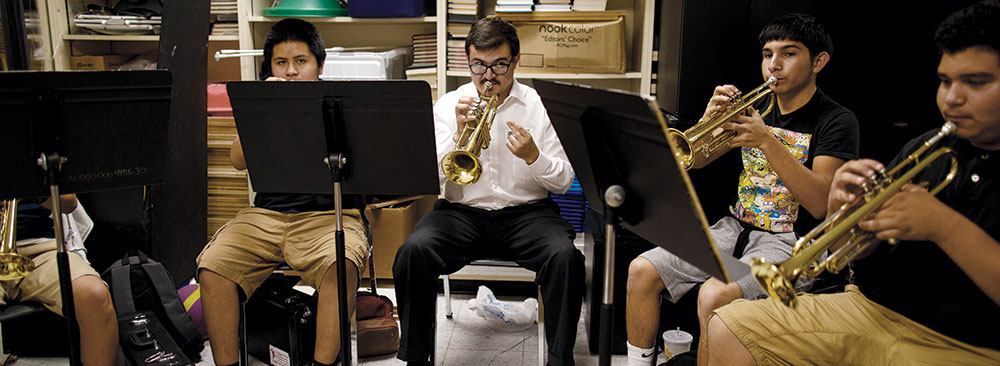 Trumpet players in practice room.