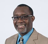 Photo shows FGCU faculty member
