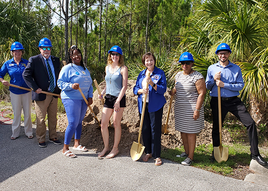 photo shows FGCU students and staff at groundbreaking