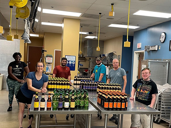 PHoto shows FGCU brewery team