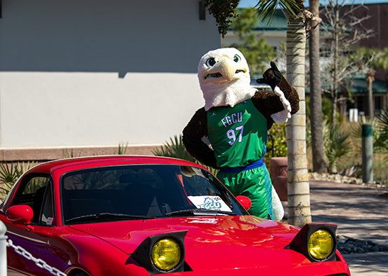 Photo shows FGCU mascot with car
