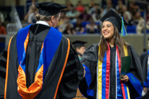 Photo shows FGCU graduate