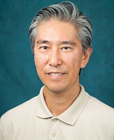 headshot of FGCU faculty member Kazuo Nakatani