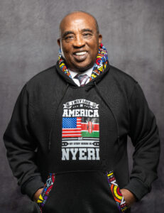 Headshot of a professor in a black sweatshirt