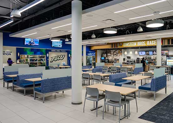 Photo shows renovations of Cohen Center, including new furnishings like tables and lighting