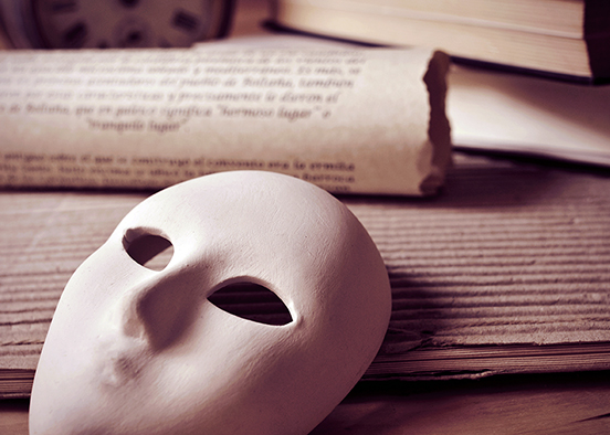 Photo illustration shows a mask and manuscript