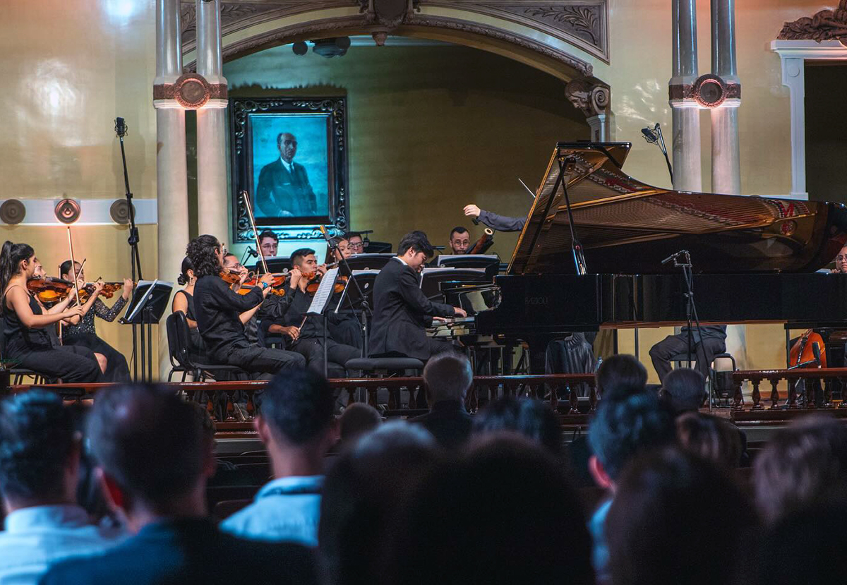 Musicians playing on stage in front of audience