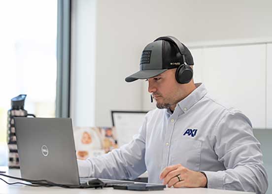 FGCU engineering alumnus works at AXI office, leading product development efforts