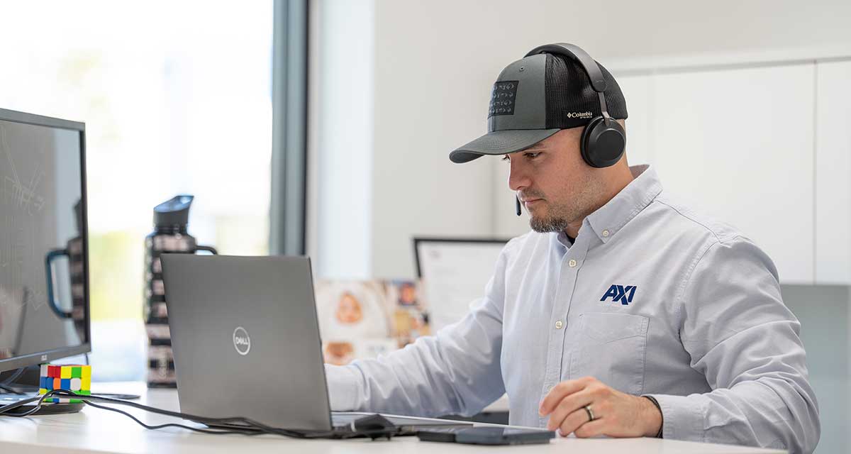 FGCU engineering alumnus works at AXI office, leading product development efforts
