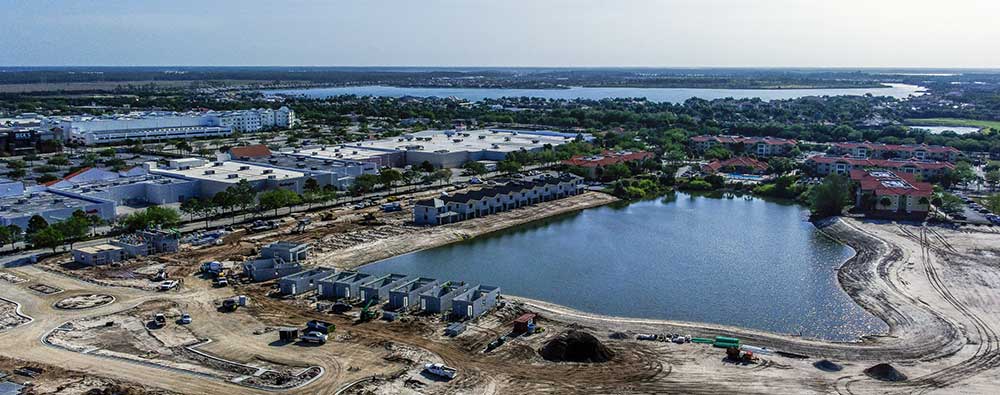 Drone view of Eagle View Village cottages and lake on FGCU-owned land