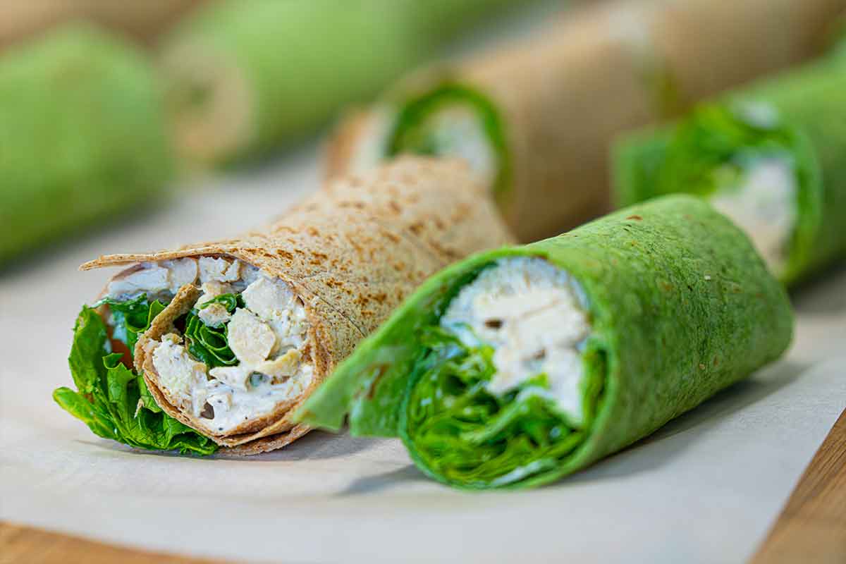 A close-up photo of twp chicken salad wraps
