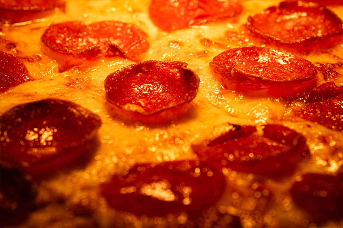 A close-up photo of pepperoni pizza