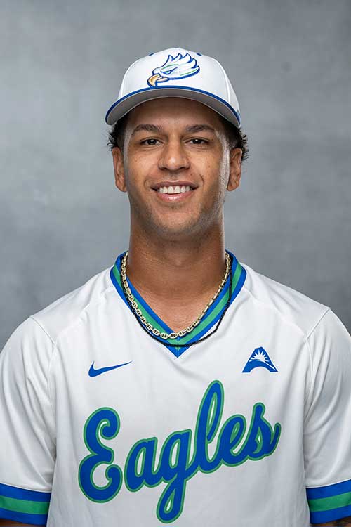 Baseball player wearing FGCU jersey