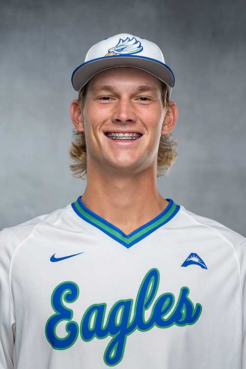 Baseball player wearing FGCU jersey