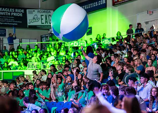 FGCU students toss a beach ball during welcome event at Alico Arena.