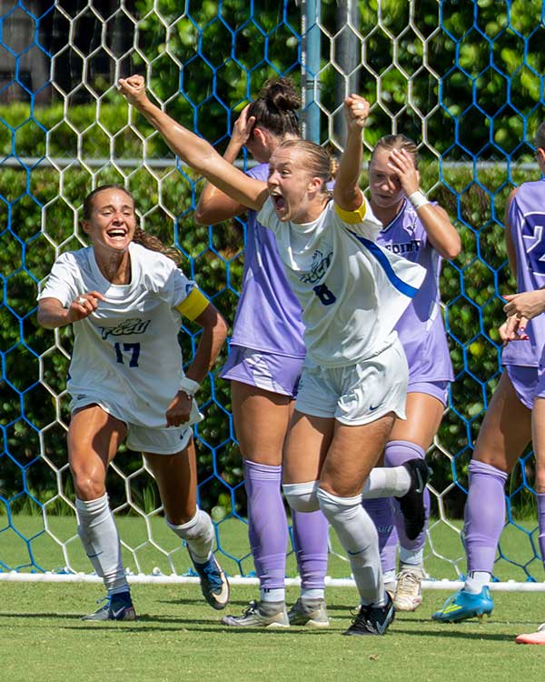 FGCU soccer captain celebrates a goal during ASUN play